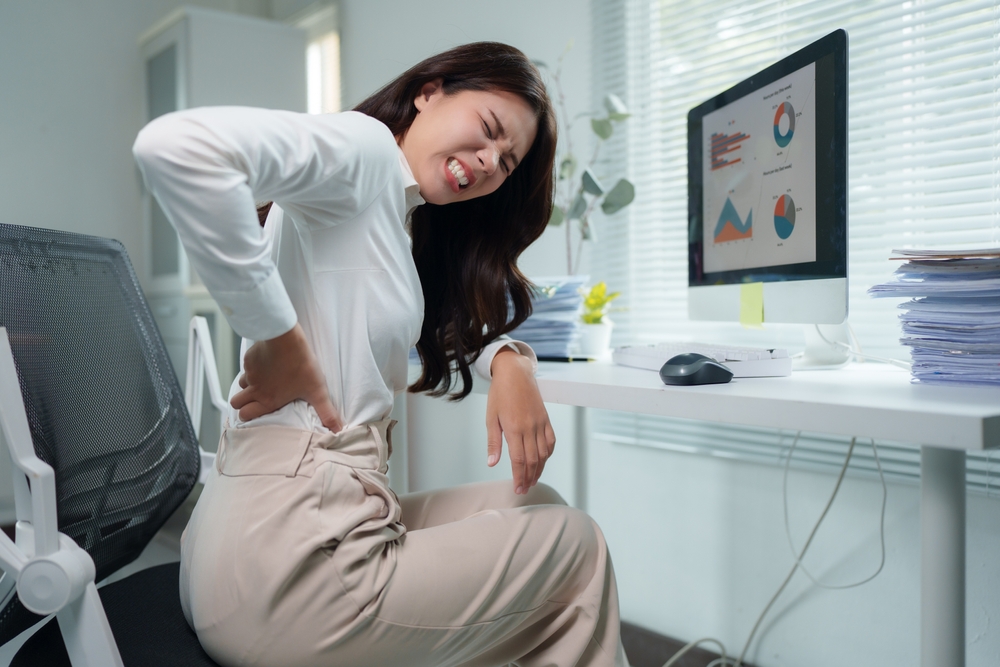 Lower Back Pain When Sitting: Causes and Treatment Options